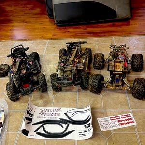 3 different Traxxas bodies. One is a stampede and the other two were sports.
